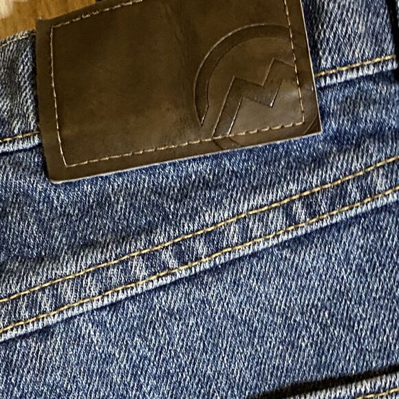 Magellan Outdoors 38x34 Blue Jeans Medium Wash Classic Heavy Denim Work Pants - Picture 8 of 11